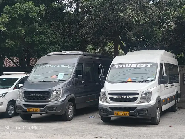 Two Force Urbania minibuses, front view